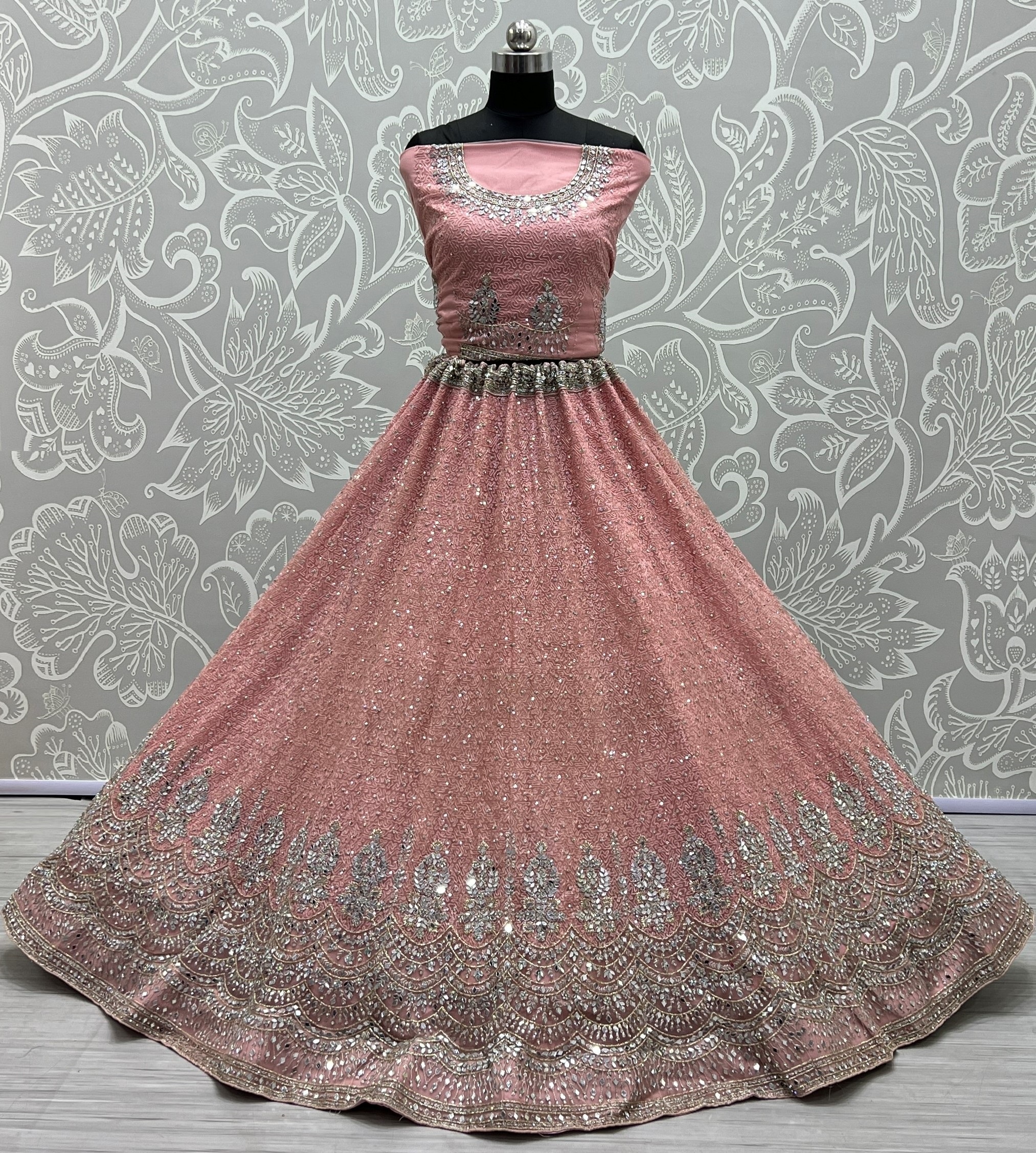 Invaluable Pink Sequins Embroidered Net Wedding Wear Lehenga Choli